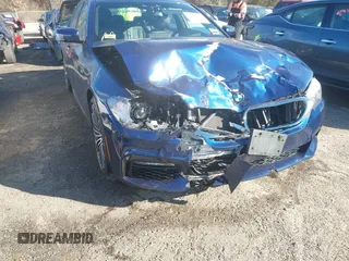 2017 BMW 5 Series 530i xDrive with VIN WBAJA7C32HG907106, listed as a IAAI auction lot 41020855 with 70,650 mi miles and . Bid and sale history available at carsss.com. Image 6.