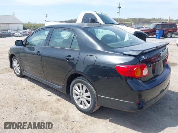 2009 Toyota Corolla with VIN 1NXBU40E29Z085117, listed as a IAAI auction lot 42059893 with 199,576 mi miles. Bid and sale history available at carsss.com. Image 3.