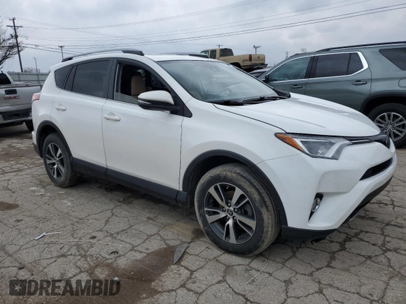 2018 Toyota RAV4 XLE with VIN JTMWFREV2JD108986, listed as a Copart auction lot 45220965 with 0 mi miles and Salvage Title. Bid and sale history available at carsss.com. Image 4.