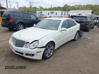 2009 Mercedes-Benz E Luxury 3.5L with VIN WDBUF87X59B426574, listed as a IAAI auction lot 42071063 with 135,622 mi miles. Bid and sale history available at carsss.com. Image 2.