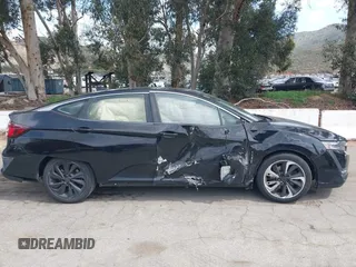2018 Honda Clarity Plug-In Hybrid with VIN JHMZC5F10JC014054, listed as a IAAI auction lot 41932195 with 100,643 mi miles. Bid and sale history available at carsss.com. Image 13.