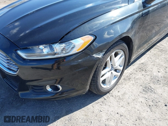 2014 Ford Fusion SE with VIN 1FA6P0HDXE5370384, listed as a IAAI auction lot 41973412 with 147,459 mi miles and . Bid and sale history available at DreamBid. Image 13.