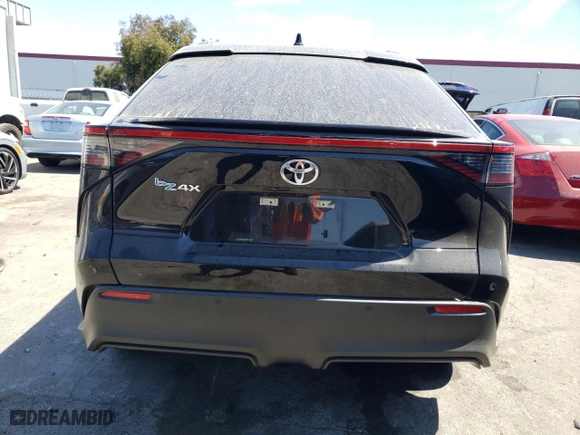 2023 Toyota bZ4X XLE with VIN JTMAAAAAXPA021070, listed as a Copart auction lot 65193554 with 15,344 mi miles and Salvage Title. Bid and sale history available at carsss.com. Image 6.