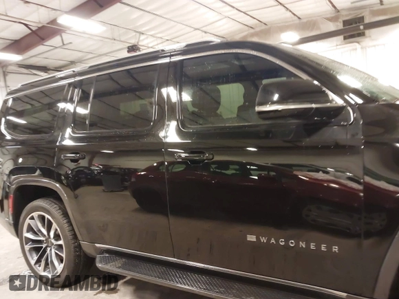 2022 Jeep Wagoneer Series II with VIN 1C4SJVBT5NS127476, listed as a IAAI auction lot 41807474 with 48,703 mi miles and . Bid and sale history available at DreamBid. Image 14.