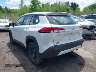 2024 Toyota Corolla Cross L with VIN 7MUAAABG5RV117722, listed as a IAAI auction lot 42241678 with 10,148 mi miles and . Bid and sale history available at DreamBid. Image 3.