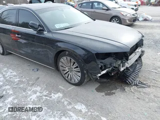 2015 Audi A8 L 4.0T with VIN WAU32AFD7FN006233, listed as a IAAI auction lot 41353034 with 119,693 mi miles. Bid and sale history available at carsss.com. Image 18.