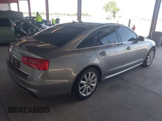 2012 Audi A6 3.0T Prestige with VIN WAUHGAFC6CN080091, listed as a IAAI auction lot 41964023 with 166,334 mi miles. Bid and sale history available at carsss.com. Image 4.