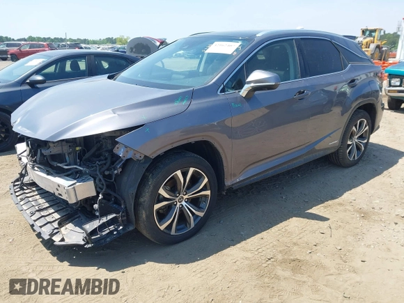 2021 Lexus RX 450h with VIN 2T2HGMDA6MC065516, listed as a IAAI auction lot 42162407 with 81,501 mi miles and . Bid and sale history available at DreamBid. Image 2.