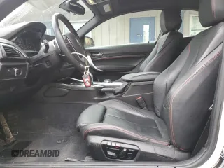 2015 BMW 2 Series 228i xDrive with VIN WBA1F7C55FVX95879, listed as a Copart auction lot 50167085 with 84,804 mi miles and Salvage Title. Bid and sale history available at carsss.com. Image 7.