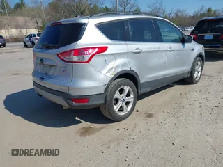 2015 Ford Escape SE with VIN 1FMCU9GX8FUA01774, listed as a IAAI auction lot 42105808 with 119,847 mi miles. Bid and sale history available at carsss.com. Image 4.
