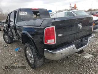2014 Ram 2500 Laramie with VIN 3C6UR5NL0EG320324, listed as a Copart auction lot 84502324 with 180,712 mi miles and Salvage title. Bid and sale history available at DreamBid. Image 2.