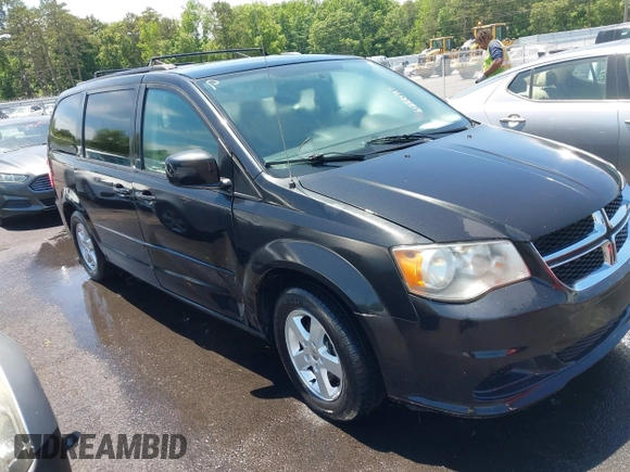 2012 Dodge Grand Caravan SXT with VIN 2C4RDGCG8CR247824, listed as a IAAI auction lot 42210397 with 200,919 mi miles and . Bid and sale history available at DreamBid. Image 1.