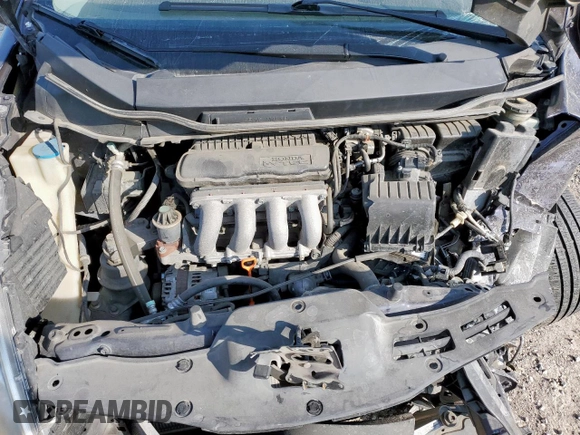 2009 Honda Fit Sport z VIN JHMGE88479S009638, wystawiony jako Copart lot #59407455 z przebiegiem Nie podano mil oraz Szkoda całkowita • Salvage title. Historia ofert i sprzedaży dostępna na DreamBid. Obrazek 11.