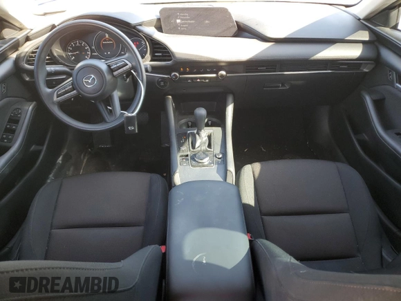 2021 Mazda 3 2.0 with VIN JM1BPAA73M1334402, listed as a Copart auction lot 79271134 with 27,338 mi miles and Salvage Title. Bid and sale history available at DreamBid. Image 8.