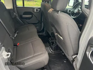 2019 Jeep Wrangler Unlimited Sport S with VIN 1C4HJXDG9KW569235, listed as a Copart auction lot 60338215 with 47,107 mi miles and Clean title. Bid and sale history available at DreamBid. Image 6.