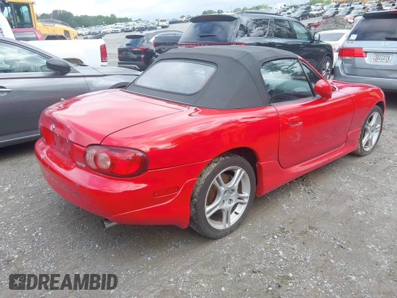 2004 Mazda MX-5 Miata LS with VIN JM1NB353440401450, listed as a IAAI auction lot 42542318 with 106,950 mi miles and . Bid and sale history available at DreamBid. Image 4.