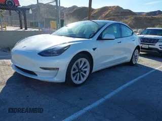 2023 Tesla Model 3 with VIN 5YJ3E1EAXPF486639, listed as a IAAI auction lot 41387797 with 18,603 mi miles and . Bid and sale history available at carsss.com. Image 2.