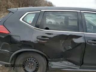 2017 Nissan Rogue SV z VIN KNMAT2MV6HP567975, wystawiony jako Copart lot #51573335 z przebiegiem 109 489 mil mil oraz Szkoda całkowita • Salvage title. Historia ofert i sprzedaży dostępna na DreamBid. Obrazek 11.
