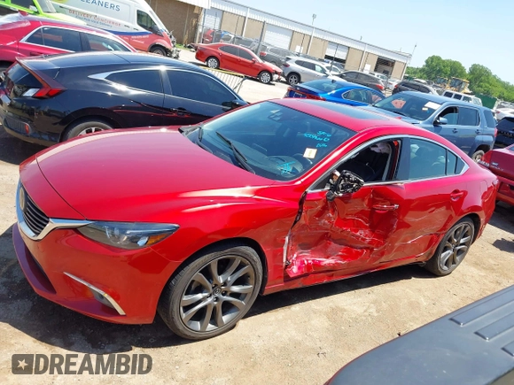 2016 Mazda 6 i Grand Touring с VIN JM1GJ1W53G1437385, выставлен на аукционе IAAI как лот 42249660 с пробегом 57 982 миль миль и . История ставок и продаж доступна на DreamBid. Изображение 14.