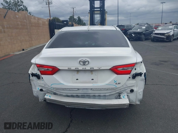 2020 Toyota Camry LE with VIN 4T1C11AK3LU882824, listed as a IAAI auction lot 41765544 with 48,209 mi miles and . Bid and sale history available at carsss.com. Image 17.