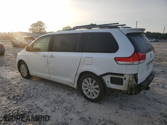 2011 Toyota Sienna XLE with VIN 5TDDK3DC1BS011963, listed as a Copart auction lot 54951565 with 196,868 mi miles and Salvage title. Bid and sale history available at DreamBid. Image 2.