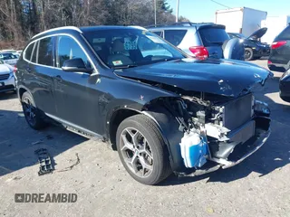 2019 BMW X1 xDrive28i with VIN WBXHT3C50K5L35416, listed as a IAAI auction lot 41195144 with 75,643 mi miles. Bid and sale history available at carsss.com. Image 1.