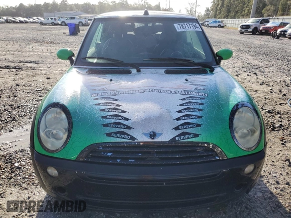 2006 MINI Convertible с VIN WMWRF33526TG16112, выставлен на аукционе Copart как лот 78717194 с пробегом 204 914 миль миль и Списание • Salvage title. История ставок и продаж доступна на DreamBid. Изображение 5.