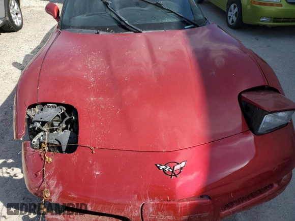 1999 Chevrolet Corvette with VIN 1G1YY22GXX5129127, listed as a Copart auction lot 69924104 with 60,905 mi miles and Salvage Title. Bid and sale history available at carsss.com. Image 12.