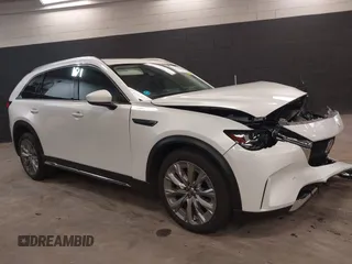 2024 Mazda CX-90 Premium with VIN JM3KKDHD2R1173356, listed as a IAAI auction lot 42421048 with 8,376 mi miles and . Bid and sale history available at DreamBid. Image 1.