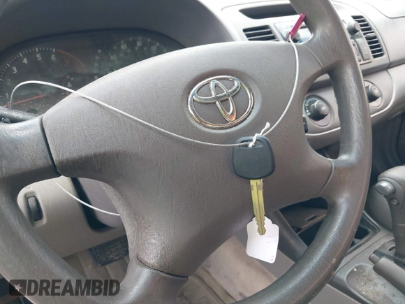 2004 Toyota Camry LE with VIN 4T1BE32K84U340887, listed as a IAAI auction lot 42143000 with Not Provided miles and . Bid and sale history available at DreamBid. Image 11.