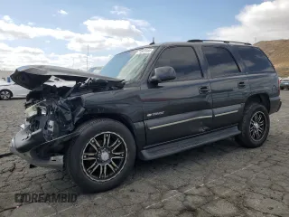 2003 Chevrolet Tahoe LT with VIN 1GNEC13TX3R293907, listed as a Copart auction lot 71849144 with 238,669 mi miles and Salvage Title. Bid and sale history available at carsss.com. Image 1.