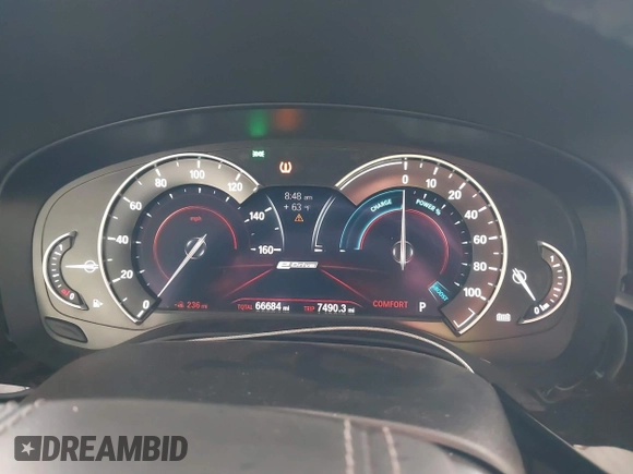 2018 BMW 5 Series 530e with VIN WBAJA9C57JB034128, listed as a IAAI auction lot 41800329 with 66,684 mi miles and . Bid and sale history available at DreamBid. Image 7.