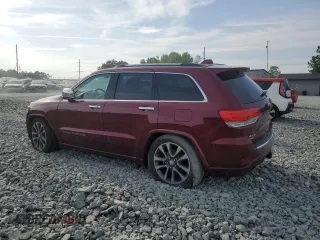 2017 Jeep Grand Cherokee Overland z VIN 1C4RJFCG5HC615878, wystawiony jako Copart lot #52087675 z przebiegiem 90 353 mil mil oraz Szkody całkowita. Historia ofert i sprzedaży dostępna na DreamBid. Obrazek 2.