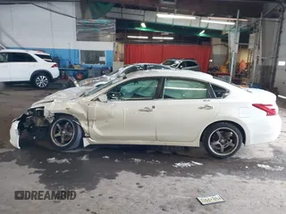 2016 Nissan Altima SR with VIN 1N4AL3AP1GC174425, listed as a IAAI auction lot 41177401 with 173,374 mi miles and . Bid and sale history available at DreamBid. Image 13.