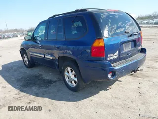 2003 GMC Envoy SLE with VIN 1GKDT13S432364768, listed as a IAAI auction lot 41467418 with 220,170 mi miles. Bid and sale history available at carsss.com. Image 3.