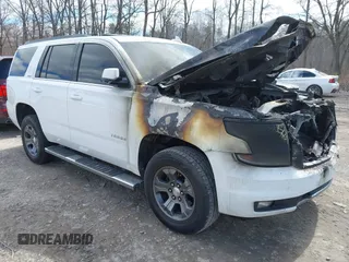 2016 Chevrolet Tahoe LT z VIN 1GNSKBKC2GR330953, wystawiony jako IAAI lot #42002848 z przebiegiem 150 000 mil mil oraz . Historia ofert i sprzedaży dostępna na DreamBid. Obrazek 1.