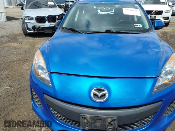 2012 Mazda 3 i Touring z VIN JM1BL1L85C1661934, wystawiony jako IAAI lot #42746228 z przebiegiem 165 386 mil mil oraz . Historia ofert i sprzedaży dostępna na DreamBid. Obrazek 15.