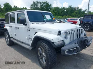 2019 Jeep Wrangler Unlimited Sahara with VIN 1C4HJXEG2KW576753, listed as a IAAI auction lot 42292197 with 95,833 mi miles and . Bid and sale history available at DreamBid. Image 1.