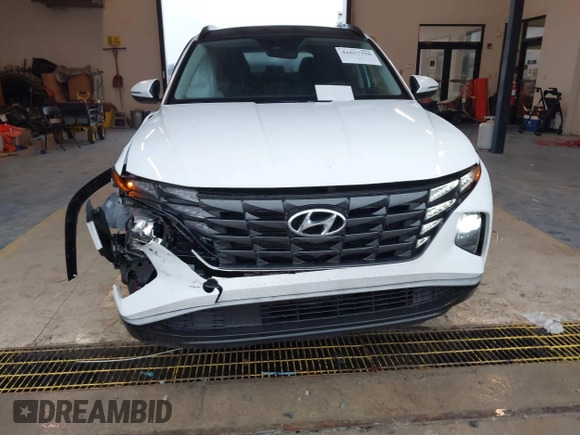 2022 Hyundai Tucson SEL Convenience with VIN KM8JFCA1XNU075554, listed as a IAAI auction lot 41617350 with 29,676 mi miles and . Bid and sale history available at carsss.com. Image 6.
