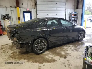 2016 Lincoln MKZ with VIN 3LN6L2JK4GR629425, listed as a Copart auction lot 52854645 with 127,981 mi miles and Salvage title. Bid and sale history available at DreamBid. Image 3.