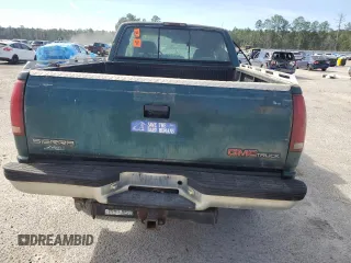 1995 GMC Sierra 1500 z VIN 2GTEK19K1S1561454, wystawiony jako Copart lot #47128465 z przebiegiem 178 963 mil mil oraz Szkody całkowita. Historia ofert i sprzedaży dostępna na DreamBid. Obrazek 6.
