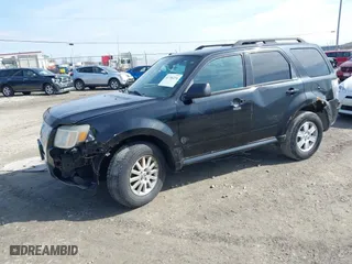 2010 Mercury Mariner with VIN 4M2CN8B79AKJ04672, listed as a IAAI auction lot 41736274 with 129,215 mi miles. Bid and sale history available at carsss.com. Image 2.