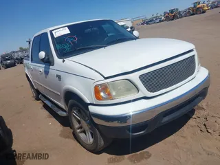2001 Ford F-150 SuperCrew XLT with VIN 1FTRW07L51KC49955, listed as a IAAI auction lot 42035123 with 396,961 mi miles. Bid and sale history available at carsss.com. Image 1.