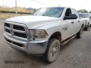 2015 Ram 2500 Tradesman z VIN 3C6TR5CT5FG664005, wystawiony jako IAAI lot #42444855 z przebiegiem 183 397 mil mil oraz . Historia ofert i sprzedaży dostępna na DreamBid. Obrazek 1.