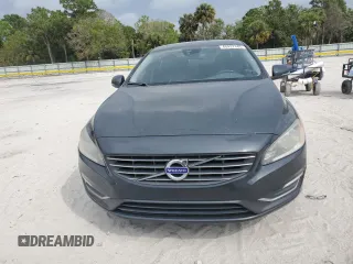 2015 Volvo S60 T5 Drive-E Premier z VIN YV140MFB3F1307970, wystawiony jako Copart lot #48437445 z przebiegiem 138 602 mil mil oraz Czysty tytuł • Clean title. Historia ofert i sprzedaży dostępna na DreamBid. Obrazek 5.