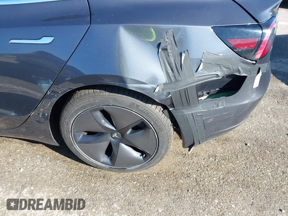 2018 Tesla Model 3 Long Range Battery with VIN 5YJ3E1EB6JF122167, listed as a IAAI auction lot 41761710 with 76,199 mi miles and . Bid and sale history available at DreamBid. Image 6.