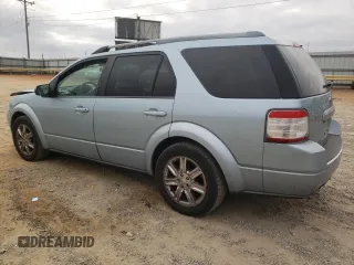 2009 Ford Taurus X Limited with VIN 1FMDK03W89GA01358, listed as a Copart auction lot 79132254 with 173,623 mi miles and Salvage title. Bid and sale history available at DreamBid. Image 2.