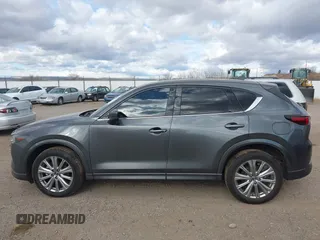 2023 Mazda CX-5 Signature with VIN JM3KFBXY9P0102087, listed as a IAAI auction lot 41771949 with 35,610 mi miles and . Bid and sale history available at carsss.com. Image 14.