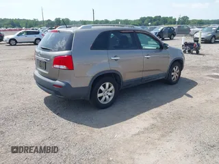 2011 Kia Sorento LX with VIN 5XYKT4A1XBG061125, listed as a IAAI auction lot 42576972 with 201,187 mi miles and . Bid and sale history available at DreamBid. Image 4.
