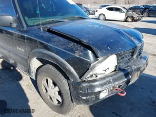 2001 Oldsmobile Bravada with VIN 1GHDT13W312117182, listed as a IAAI auction lot 41457726 with 160,288 mi miles. Bid and sale history available at carsss.com. Image 6.